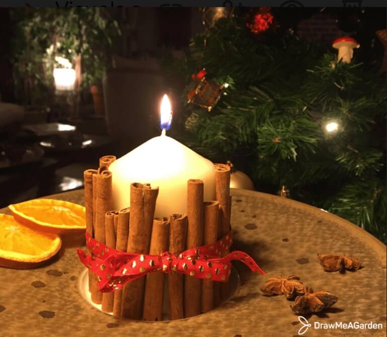 DIY bougie de Noël épicée avec des bâtons de cannelle